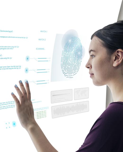 Girl coding on a interactive screen